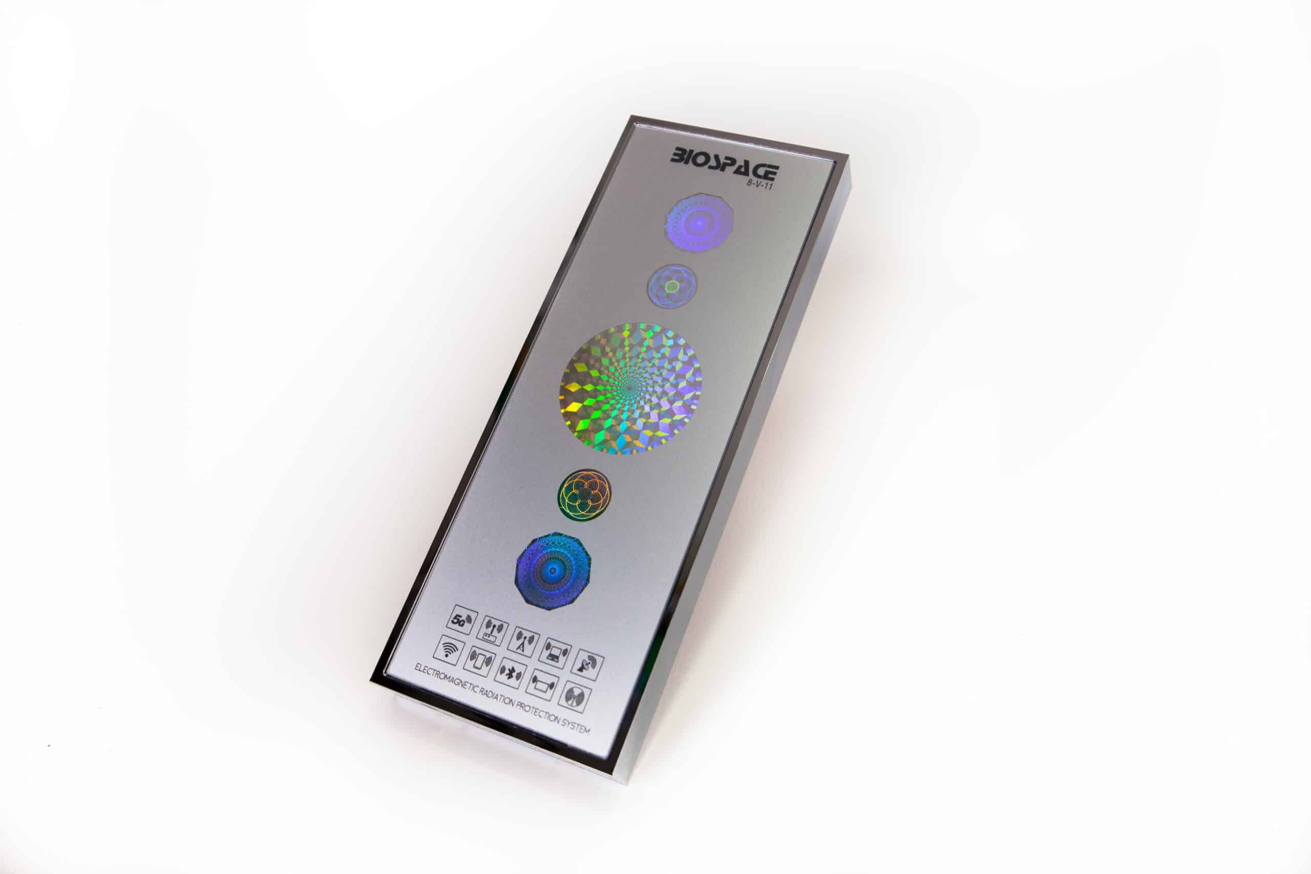 BioSpace 8V11 Diamond is a silver packaging featuring multicolored design elements and icons, specifically designed for a unique product display. The box highlights various circular graphics with holographic effects, showcasing brand information.