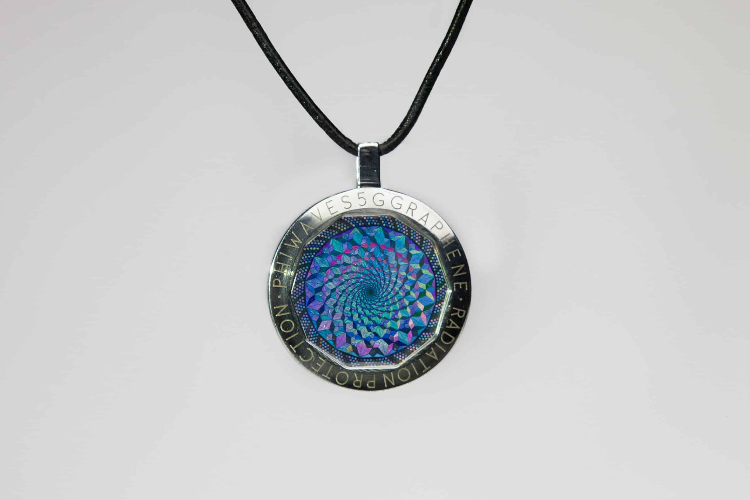 PhiWaves Jewel Diamond pendant featuring a spiral design in blue and purple with metallic accents. The pendant hangs from a black cord, showcasing a unique aesthetic and intricate patterns.