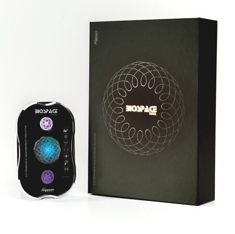 BioSpace Travel Diamond device shown next to its packaging featuring a black box with a circular design and the brand name, both in white and silver text. The device has a glossy black finish with colorful light indicators.
