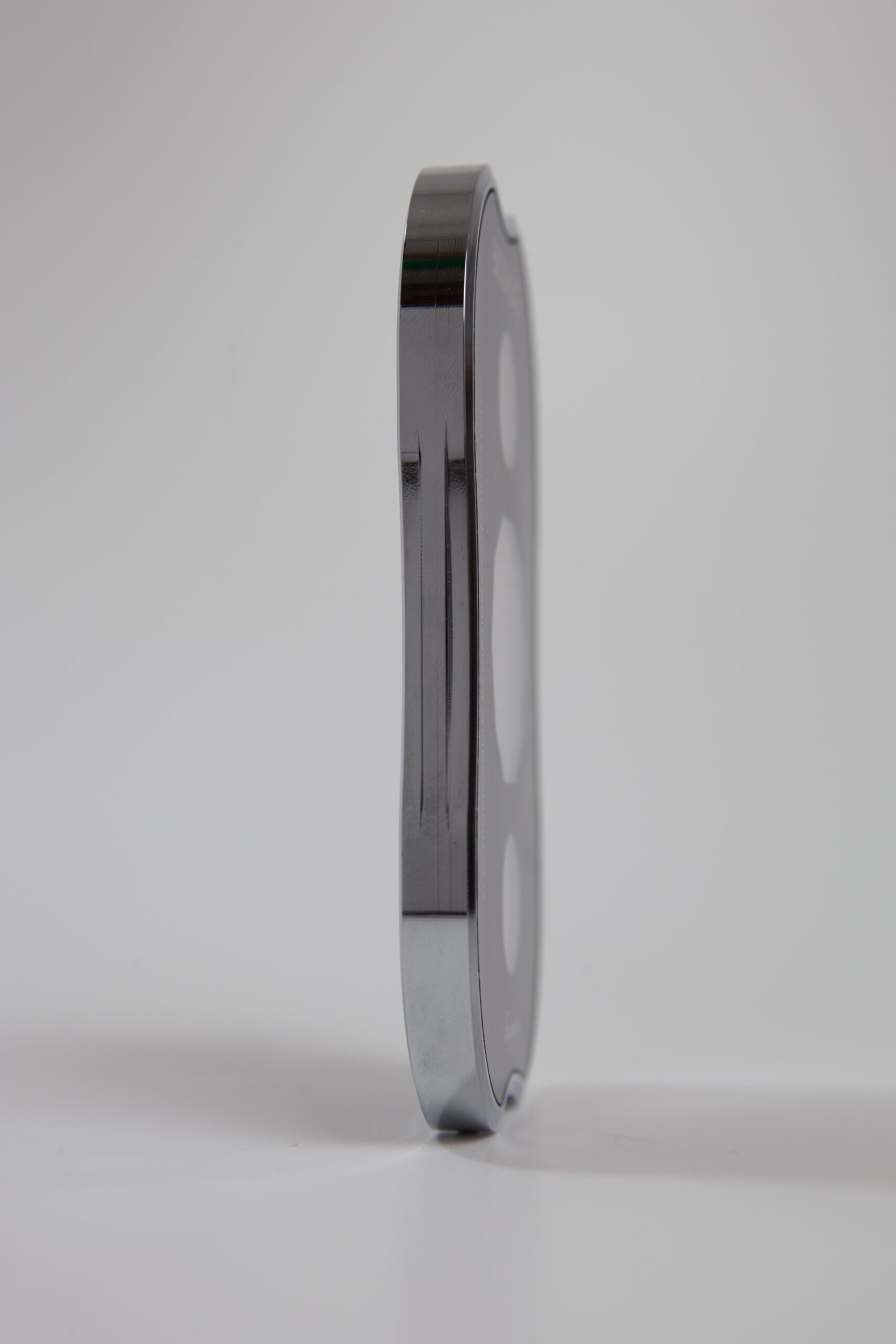 BioSpace Travel Diamond in a sleek, oval design, featuring a shiny chrome finish. The product showcases a minimalist profile and is designed for portable convenience, reflecting a modern aesthetic.