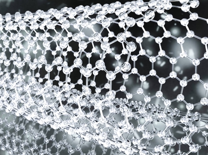 A close-up view of a transparent molecular structure composed of interconnected spheres and lines, resembling a crystalline pattern. The background is blurred, highlighting the clarity and detail of the molecular arrangement.