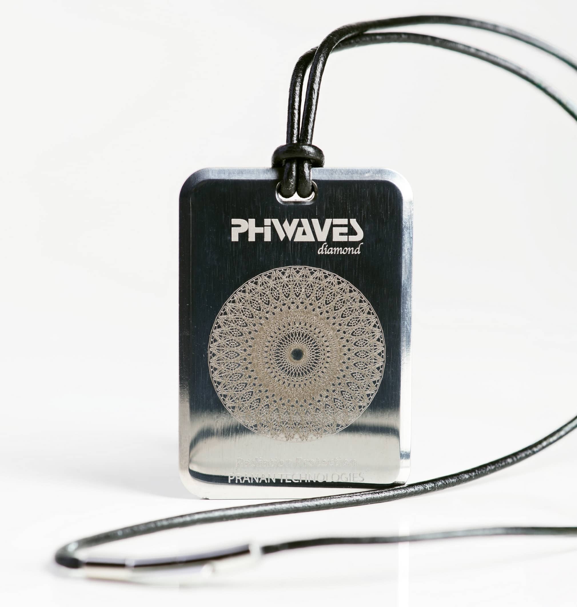 PhiWaves Pendant Diamond shown in silver metal with a laser-etched mandala design. The pendant hangs from a simple black cord, featuring a round bail for easy wear.